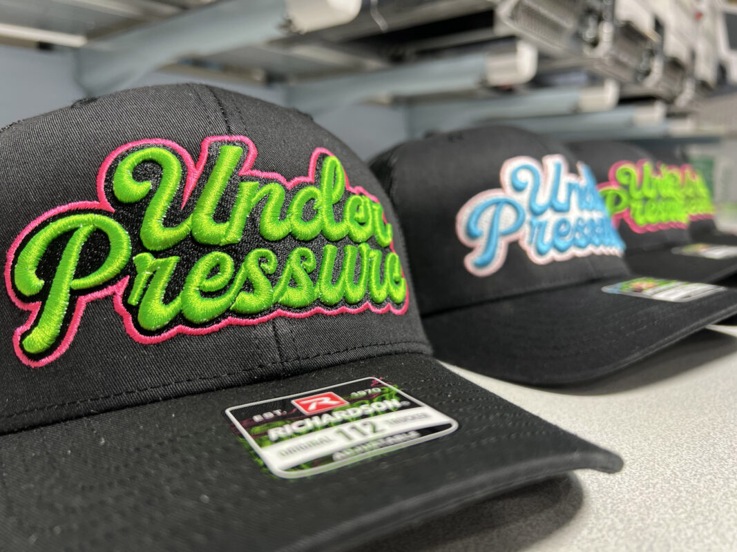 Under Pressure Print Shop embroidered logo hats