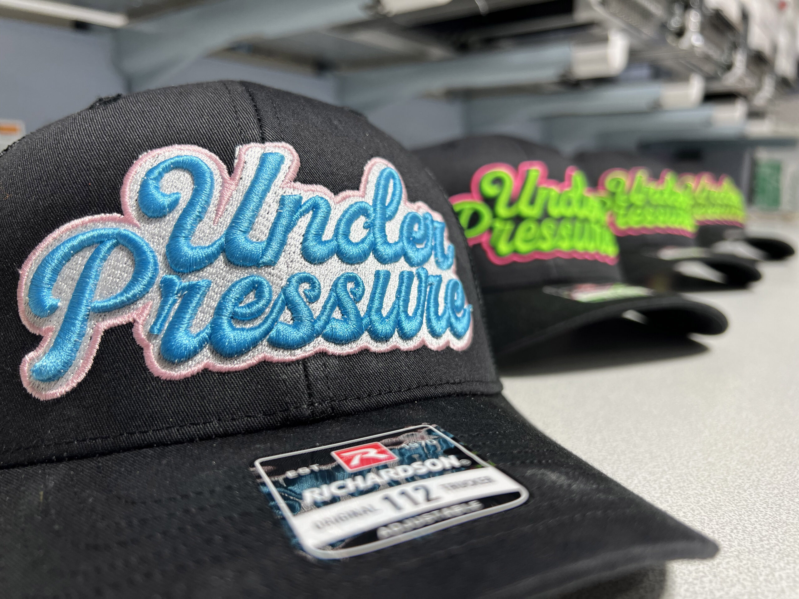 Under Pressure Print Shop embroidered logo hats